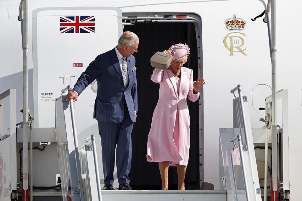 Britain's King Charles III and Camilla, the Queen Consort, arrive at Orly airport, Wednesday, Sept.20, 2023 outside Paris. King Charles III of the United Kingdom starts a three-day state visit to France on Wednesday meant to highlight the friendship between the two nations with great pomp, after the trip was postponed in March amid widespread demonstrations against President Emmanuel Macron's pension changes. (Christophe Petit Tessont, Pool via AP)