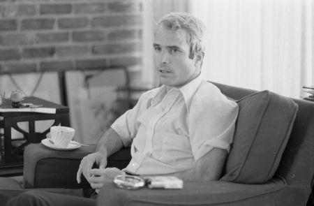 FILE PHOTO - U.S. Navy Lt. Comdr. John S. McCain is interviewed about his experiences as a prisoner of war during the war in Vietnam, April 24, 1973. Library of Congress/Thomas J. O'Halloran/Handout via REUTERS/File Photo