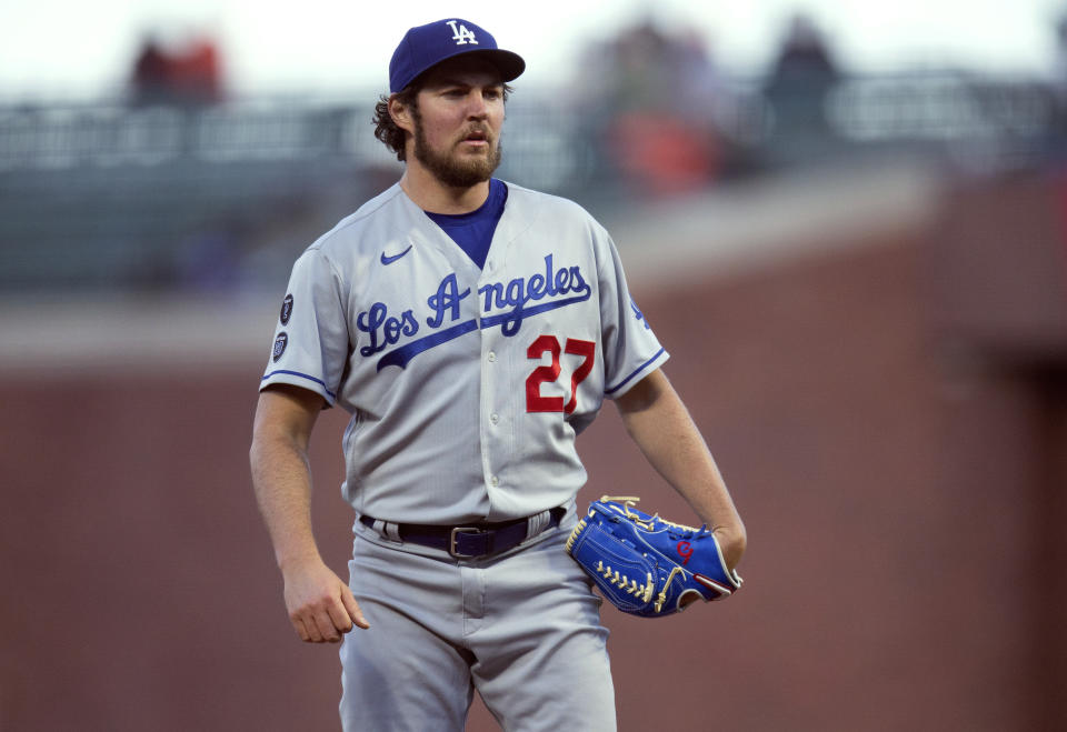 FILE - Los Angeles Dodgers starting pitcher Trevor Bauer looks toward home during the team's baseball game against the San Francisco Giants on May 21, 2021, in San Francisco. An Arizona woman who accused former pitcher Bauer of sexual assault has been charged with defrauding the baseball player. An indictment unsealed Monday, April 15, 2024, in Maricopa County Superior Court identifies Bauer as one of two victims. It charges the woman with fraud and theft by extortion, both felonies, but doesn't provide specific details about the alleged fraudulent scheme. (AP Photo/D. Ross Cameron, File)