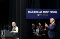 U.S. President Donald Trump and India's Prime Minister Narendra Modi participate in the "Howdy Modi" event in Houston