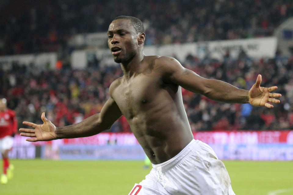 Mainz's Anthony Ujah clebrates his side's second goal during a Bundesliga soccer match between FSV Mainz 05 and Hannnover 96 in Mainz Germany, Sunday, Dec.9, 2018. (Thomas Frey/dpa via AP)