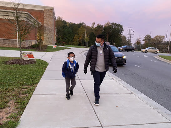 Mountain View Elementary School parent educator Ted Pedro begins each morning by greeting students and parents at the school’s drop-off lane. (Courtesy of Mebane Rash/EducationNC)