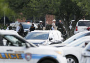 <p>Emergency responders from multiple agencies work at the scene in front of Santa Fe High School in response to a shooting on Friday, May 18, 2018, in Santa Fe, Texas. (Photo: Kevin M. Cox.The Galveston County Daily News via AP) </p>