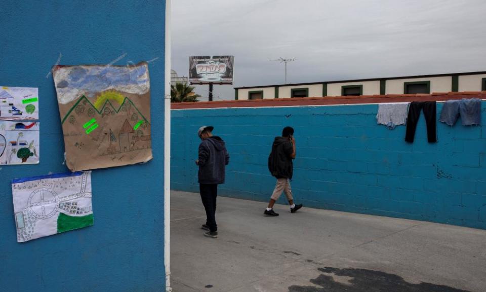 Teenage boys make their way at the yard of a migrant shelter for unaccompanied minors in Tijuana, Mexico, 5 December 2018.