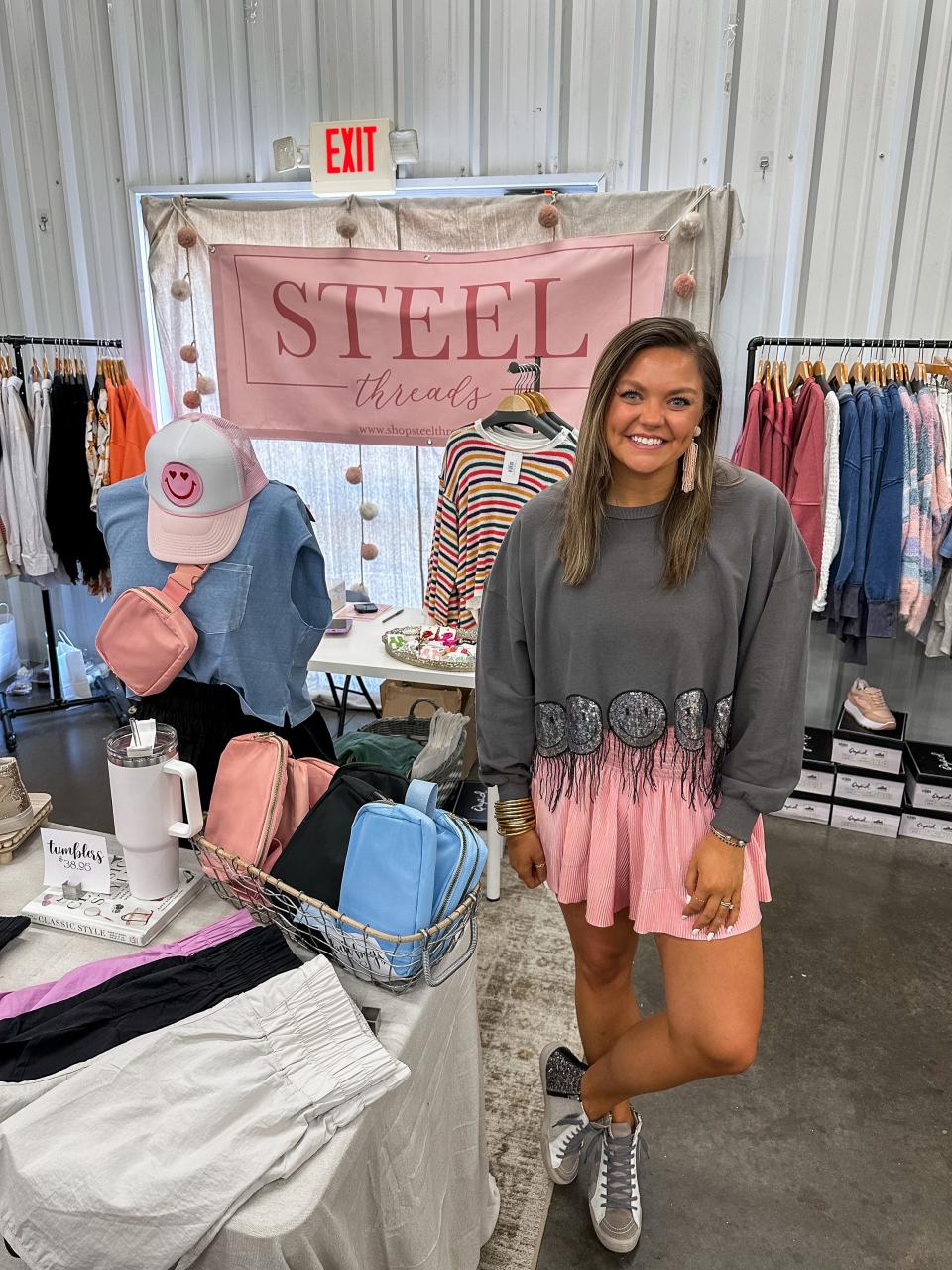 Kelsey Casteel, owner of online boutique Steel Threads, at a pop-up event. Casteel enjoys the flexibility a home-based business offers. “We are saving so much on brick and mortar costs and I can set my own schedule,” she said. “During the winter months I feel like I never leave the house, so I’ll run by the coffee shop to do just desk work or designs.”