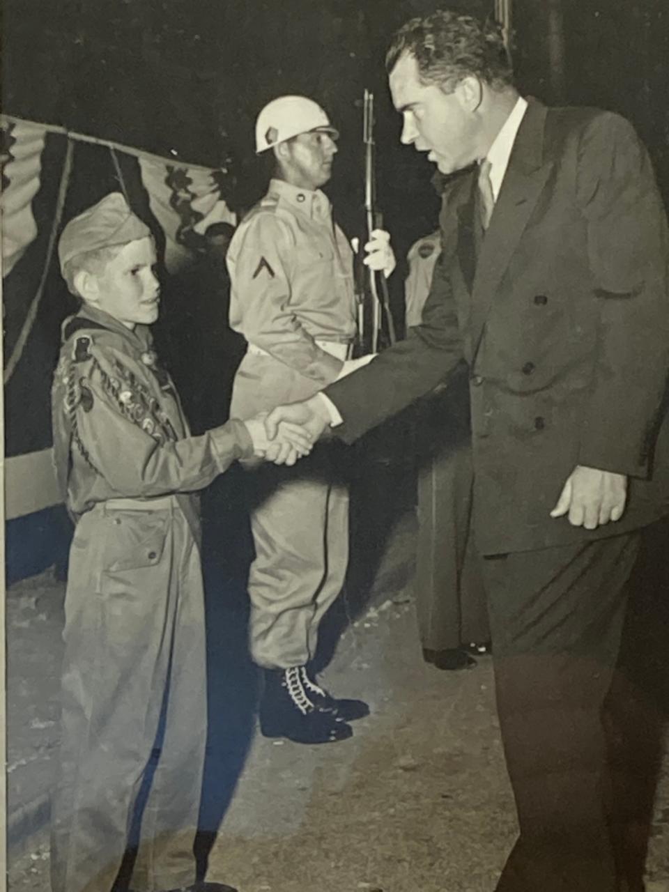 Les Singleton shaking hands with 37th U.S. President Richard Nixon at the New Year's Eve Orange Bowl Parade in 1954. [Submitted]