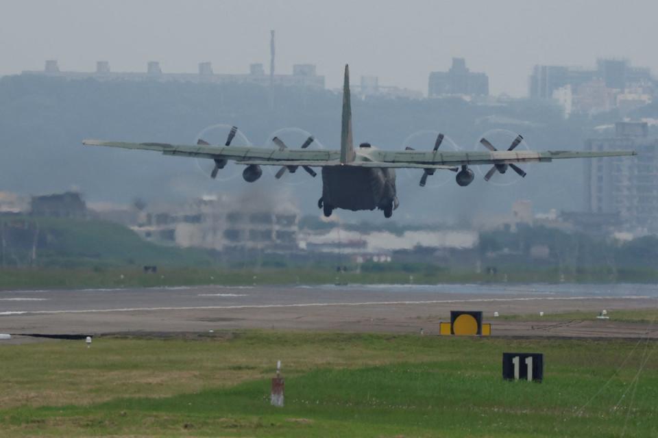 A Taiwanese air force C-130 takes off at Hsinchu (Reuters)