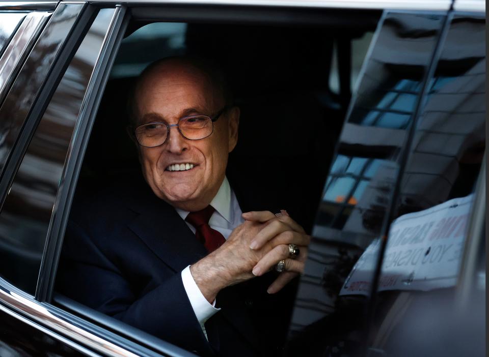 WASHINGTON, DC - DECEMBER 15: Rudy Giuliani, the former personal lawyer for former U.S. President Donald Trump, departs from the E. Barrett Prettyman U.S. District Courthouse after a verdict was reached in his defamation jury trial on December 15, 2023 in Washington, DC. A jury has ordered Giuliani to pay $148 million in damages to Fulton County election workers Ruby Freeman and Shaye Moss.