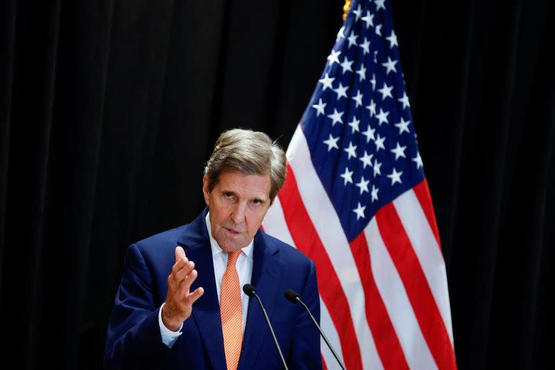 John Kerry, the U.S. special envoy on climate issues, attends a press conference in Beijing