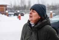 Svetlana Borisovna, mother of the miner who died in Thursday's mine accident, reacts at the entrance to the Listvyazhnaya coal mine in the Kemerovo region