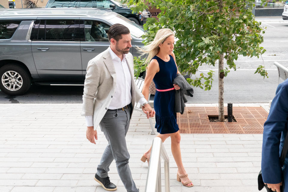 Amanda Zurawski and her husband Josh Zurawski arrive at the Travis County Courthouse on July 19, 2023 in Austin, Texas. / Credit: SUZANNE CORDEIRO/AFP via Getty Images
