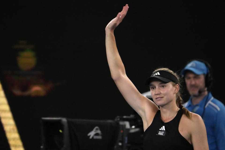 Elena Rybakina of Kazakhstan waves after defeating Victoria Azarenka of Belarus in their semifinal match at the Australian Open tennis championship in Melbourne, Australia, Thursday, Jan. 26, 2023. (AP Photo/Ng Han Guan)