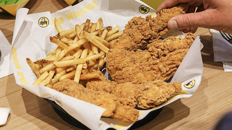 Crispy chicken tenders and fries 