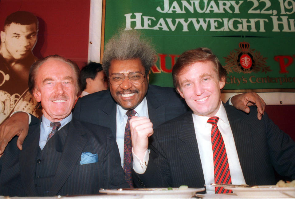 <p>Trump pictured with his father, Fred Trump and boxing promoter Don King at a press conference in December 1987 in Atlantic City, N.J. <i>(Photo: AP)</i> </p>