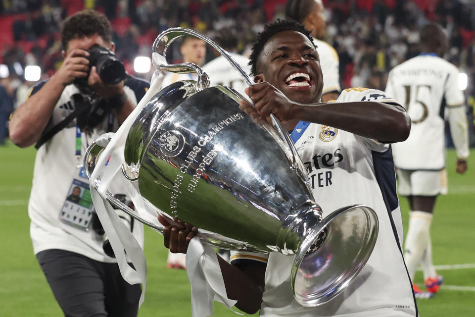 Real Madrid's Vinicius Junior celebrates at the end of the Champions League final between Borussia Dortmund and Real Madrid at Wembley Stadium in London, Saturday, June 1, 2024. Real Madrid won 2-0.  (AP Photo/Ian Walton)