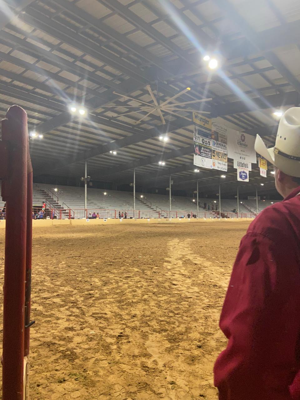 Heath Wright, entertainment committee chairman, looks out into the arena after family night on June 1 at the Old Fort Days Rodeo.