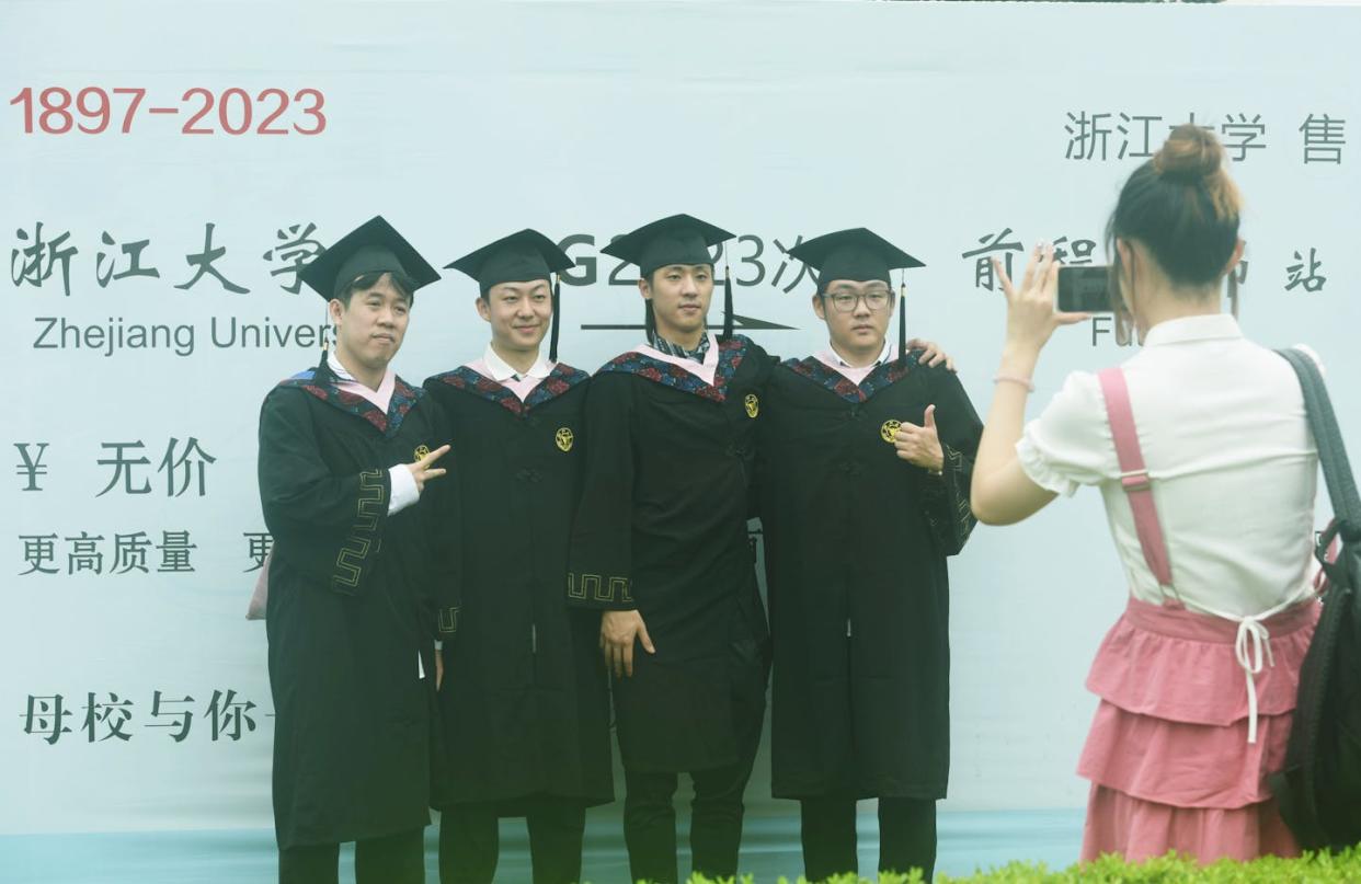 Chinese universities are prodigious producers of scientific papers, which will help garner them more prestige. <a href="https://www.gettyimages.com/detail/news-photo/students-attending-the-graduation-ceremony-pose-for-a-group-news-photo/1259030853?adppopup=true" rel="nofollow noopener" target="_blank" data-ylk="slk:CFOTO/Future Publishing via Getty Images;elm:context_link;itc:0;sec:content-canvas" class="link ">CFOTO/Future Publishing via Getty Images</a>