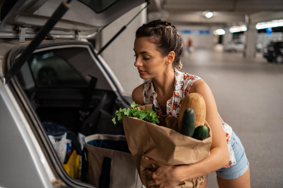 An ex-MLM distributor shares how she was told to drum up sales by approaching strangers in supermarket parking lots and offer to load their cars with groceries. (Photo: Getty)