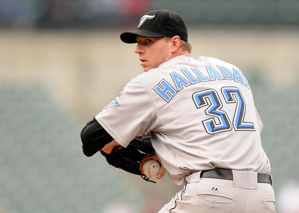 Roy Halladay #32 of the Toronto Blue Jays pitches against the Baltimore Orioles.