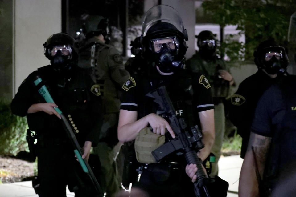 Aug 23, 2020; Kenosha, WI, USA; Police stand guard outside the Kenosha Police Department in Kenosha on Sunday, Aug. 23, 2020. Kenosha police shot a man Sunday evening, setting off unrest in the city.Mandatory Credit: Mike De Sisti/Milwaukee Journal Sentinel via USA TODAY NETWORK/Sipa USA