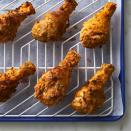 <p>In this healthy air-fried chicken recipe, we dredge the chicken twice in the flour mixture, resulting in a deliciously crisp exterior. Buffalo-style hot sauce adds subtle heat to these juicy drumsticks. Serve alongside mashed potatoes and green beans. <a href="https://www.eatingwell.com/recipe/8023016/air-fryer-fried-chicken/" rel="nofollow noopener" target="_blank" data-ylk="slk:View Recipe;elm:context_link;itc:0;sec:content-canvas" class="link ">View Recipe</a></p>