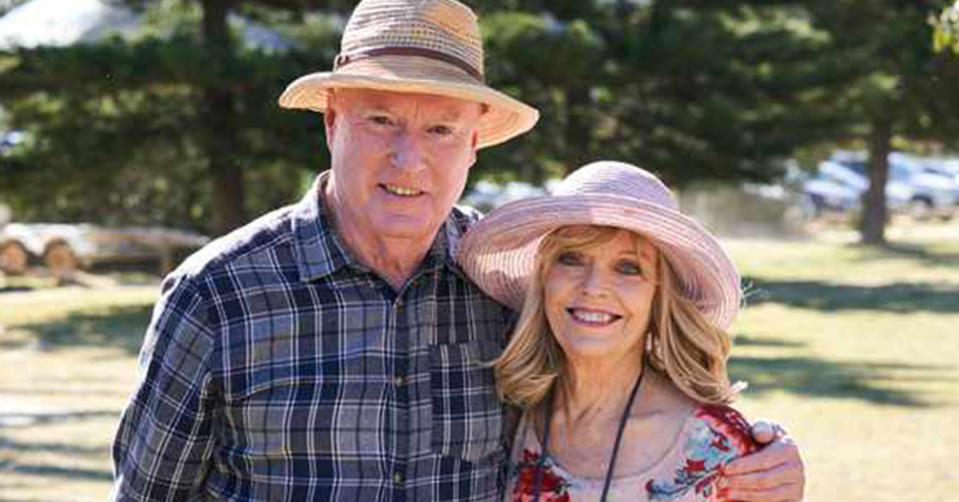 Alf and Martha smile at the camera on the set of Home and Away