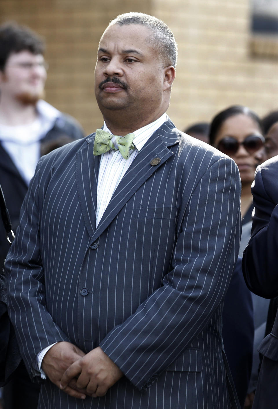 FILE - Donald Payne Jr. stands during the funeral of his father, New Jersey Congressman Donald Payne, in Newark, N.J., March 13, 2012. Payne Jr. of New Jersey died Wednesday, April 24, 2024, officials said, after suffering a heart attack earlier this month that had left him hospitalized. He was 65. (AP Photo/Julio Cortez, File)