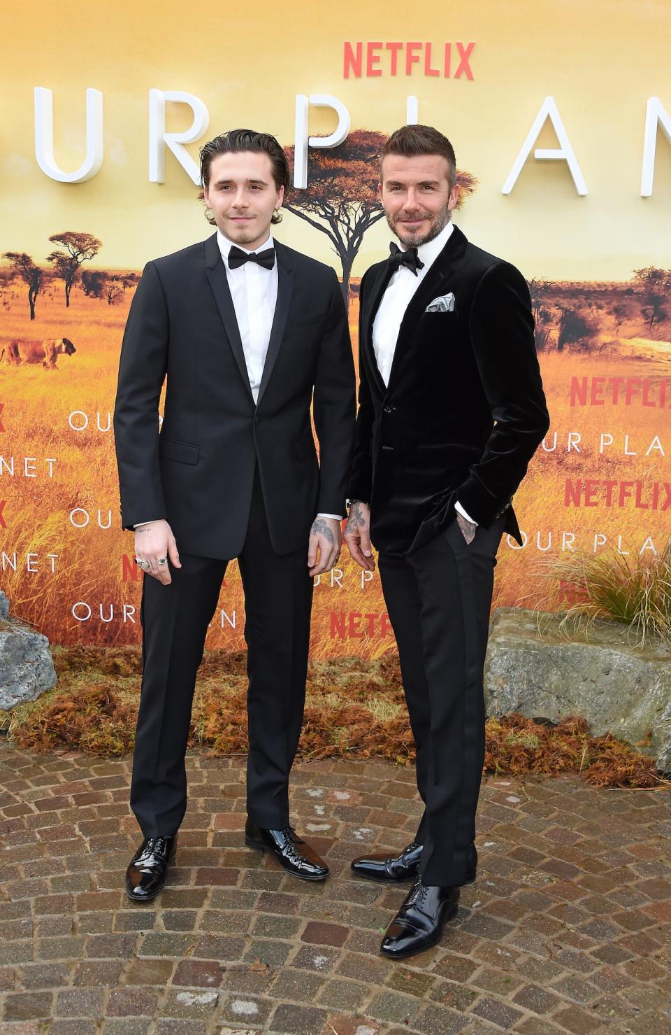 Brooklyn Beckham and David Beckham at the "Our Planet" premiere in April 2019.