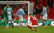 Soccer Football - Carabao Cup Final - Arsenal vs Manchester City - Wembley Stadium, London, Britain - February 25, 2018 Arsenal's Shkodran Mustafi looks dejected after the match Action Images via Reuters/Carl Recine