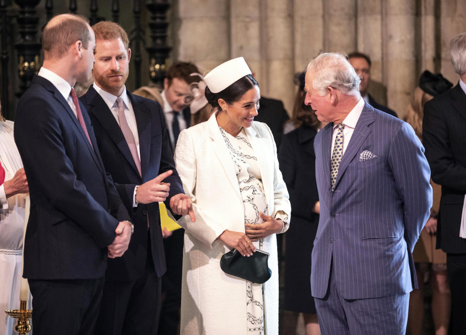 Meghan Markle, King Charles III, Prince Harry, and Prince William. ( Richard Pohle / Getty Images)