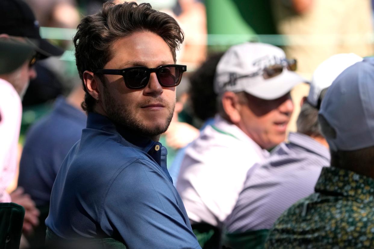 Apr 11, 2024; Augusta, Georgia, USA; Singer and songwriter Niall Horan looks on during the first round of the Masters Tournament. Mandatory Credit: Michael Madrid-USA TODAY Network