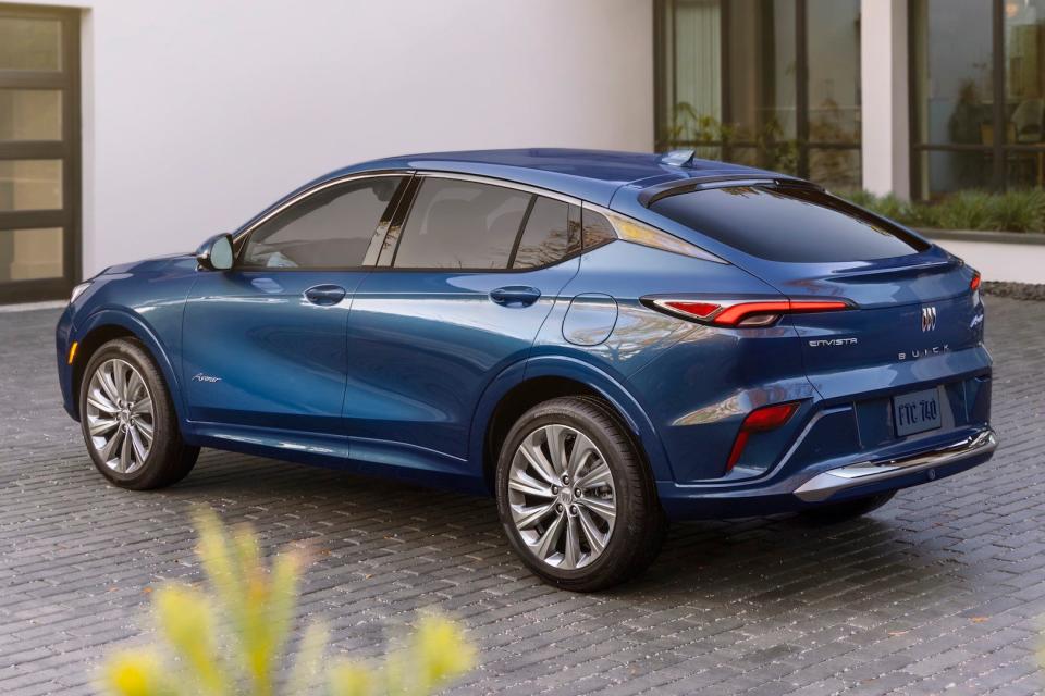 Rear 7/8 view of the 2024 Buick Envista Avenir in Ocean Blue Metallic.