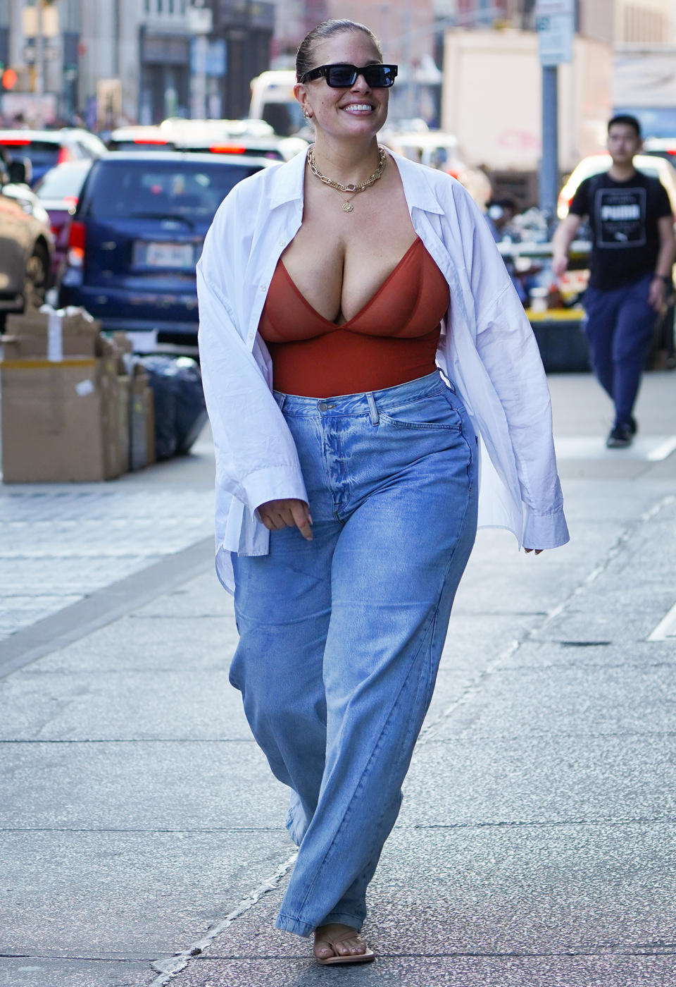 <p>Ashley Graham is in great spirits while strolling through N.Y.C. on May 12.</p>