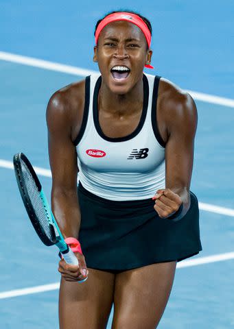 <p>Andy Cheung/Getty</p> Coco Gauff celebrates victory in the round two singles match against Emma Raducanu of Great Britain during day three of the 2023 Australian Open on January 18, 2023.