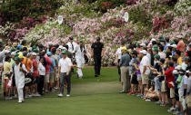 Phil Mickelson, right, and Charley Hoffman walk down the sixth fairway during the fourth round of the Masters golf tournament Sunday, April 12, 2015, in Augusta, Ga. (AP Photo/Matt Slocum)