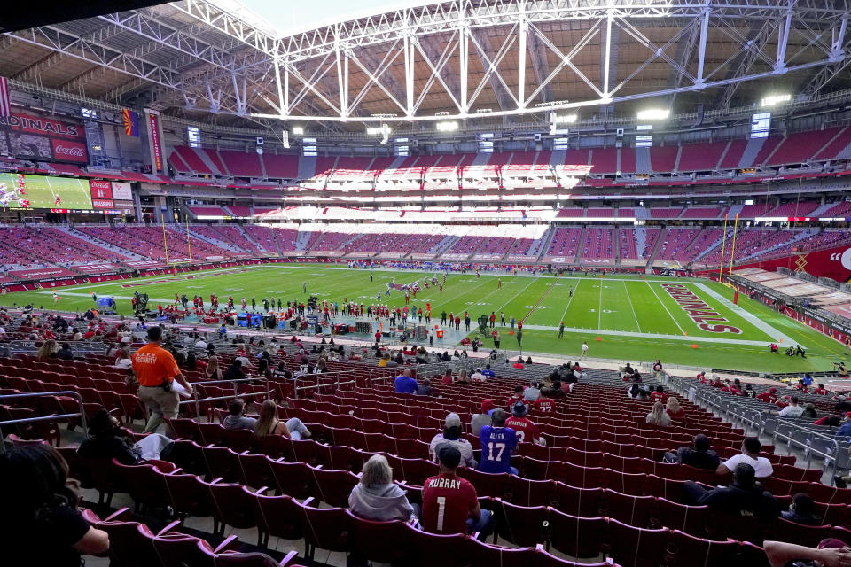 FILE - In this Sunday, Nov. 15, 2020, file photo, the Buffalo Bills and the Arizona Cardinals compete during the first half of an NFL football game in Glendale, Ariz. The San Francisco 49ers are set to embark on an unusual three-week road trip after being kicked out of their stadium and practice facility because of strict new COVID-19 protocols in their home county in Northern California. The Niners will fly to Arizona, where they will practice, live and play their next two games after Santa Clara County imposed a three-week ban on games and practices for contact sports. (AP Photo/Ross D. Franklin, File)