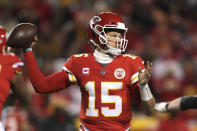 Kansas City Chiefs quarterback Patrick Mahomes (15) throws a pass during the first half of an NFL wild-card playoff football game against the Pittsburgh Steelers, Sunday, Jan. 16, 2022, in Kansas City, Mo. (AP Photo/Travis Heying)