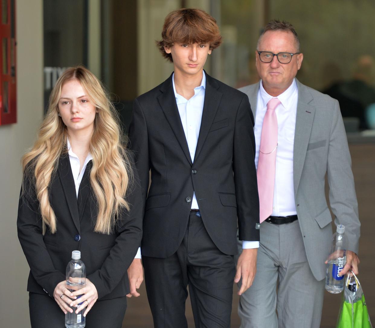 Maya, Kyle and Jack Kowalski leave the South Coutny Courthouse in Venice on Thursday afternoon at the conclusion of the first day of their civil lawsuit against Johns Hopkins All Children's Hospital.