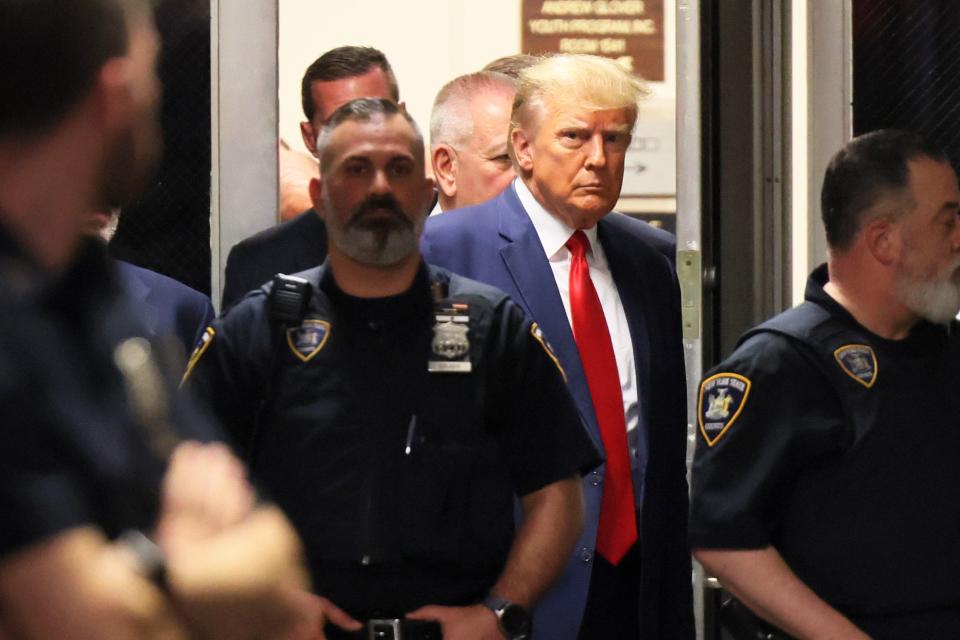 Former President Donald Trump arrives for an arraignment hearing at New York state Supreme Court on April 4, 2023 in New York City. Trump was arraigned during his first court appearance following an indictment by a grand jury that heard evidence on hush money paid to an adult film star before the 2016 election. He became the first former U.S. president to face criminal charges.