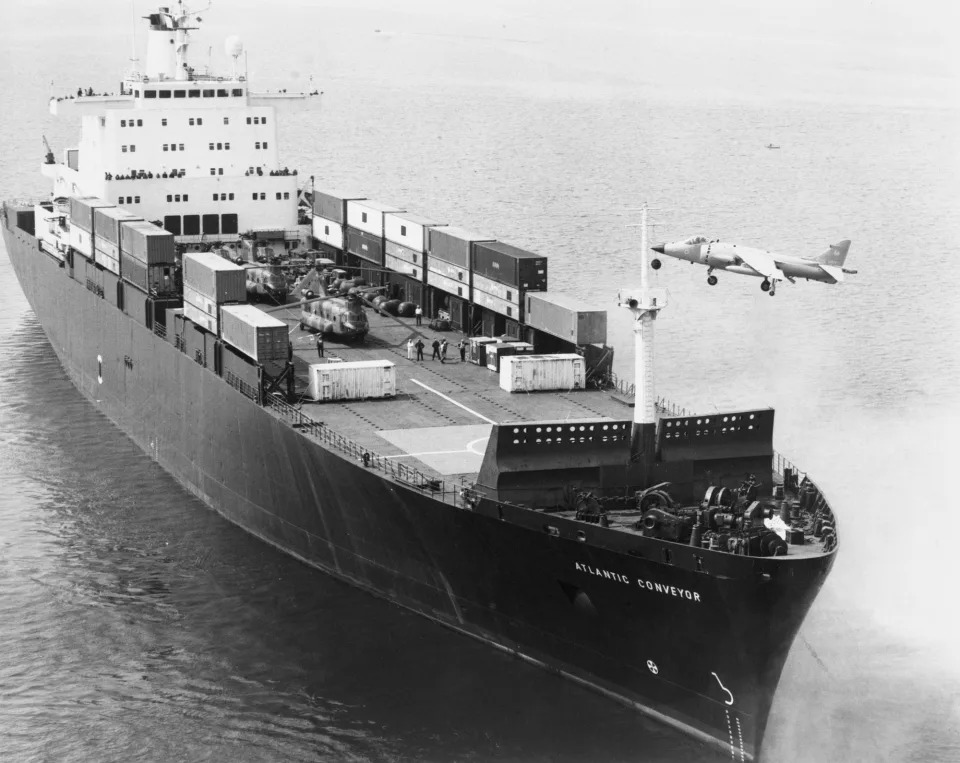 Sea Harrier approaches the container ship and aircraft carrier Atlantic Conveyor