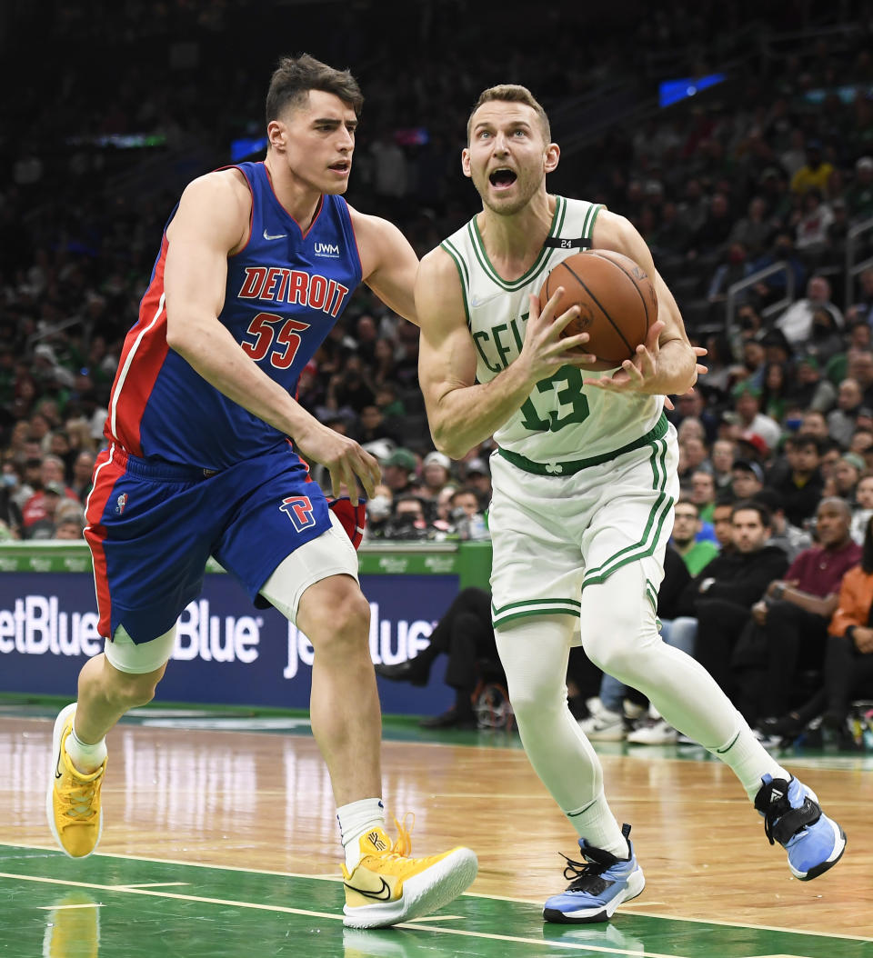 Mar 11, 2022; Boston, Massachusetts, USA; Boston Celtics guard Nik Stauskas (9) drives past <a class="link " href="https://sports.yahoo.com/nba/teams/detroit/" data-i13n="sec:content-canvas;subsec:anchor_text;elm:context_link" data-ylk="slk:Detroit Pistons;sec:content-canvas;subsec:anchor_text;elm:context_link;itc:0">Detroit Pistons</a> forward Justin Robinson (55) during the second half at TD Garden. Mandatory Credit: Bob DeChiara-USA TODAY Sports