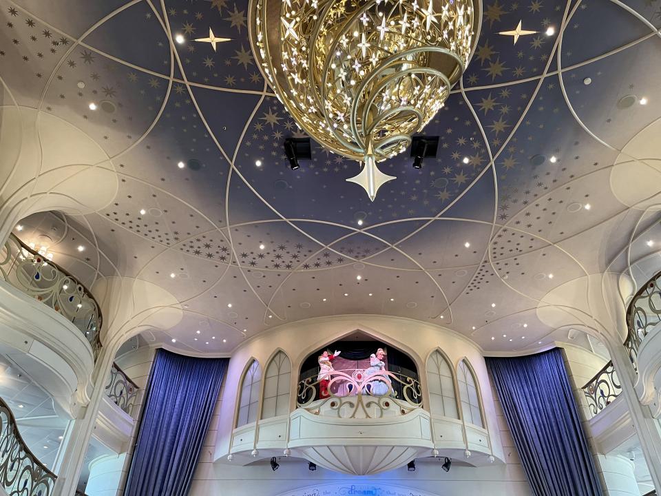 Cinderella and Prince Charming greet guests in the grand hall of the Disney Wish. (Photo: Carly Caramanna)