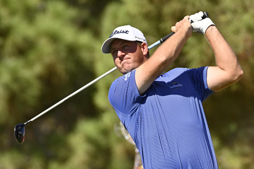 Tom Hoge watches his tee shot on the first hole hole during the final round of the Shriners Children's Open golf tournament, Sunday, Oct. 9, 2022, in Las Vegas. (AP Photo/David Becker)