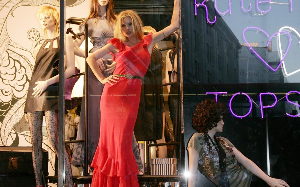 Kate Moss causing a stir in the Topshop window - AP Photo/Sang Tan