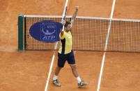 Switzerland's Stanislas Wawrinka celebrates after beating Canada's Milos Raonic on April 18, 2014 during their Monte-Carlo ATP Masters Series Tournament tennis match in Monaco