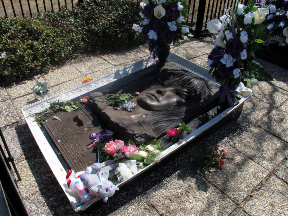 In this March 14, 2013 photo, the resting place of the late Tejano singer Selena is shown at the Seaside Memorial Park in Corpus Christi, Texas. The coastal Texas city's deep roots in Mexican American history is often overlooked as visitors mainly come here for a quick beach getaway. (AP Photo/Russell Contreras)