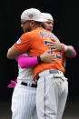 Chicago White Sox's Yoan Moncada hugs Houston Astros' Jose Abreu (79) before their baseball game in Chicago, Sunday, May 14, 2023. (AP Photo/Nam Y. Huh)