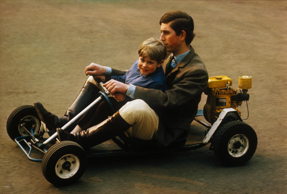 Go carting is a sport usually for one person at a time, but in the secluded grounds of the family home at Windsor, Prince Charles takes his younger brother Prince Edward for a spin in this photograph.