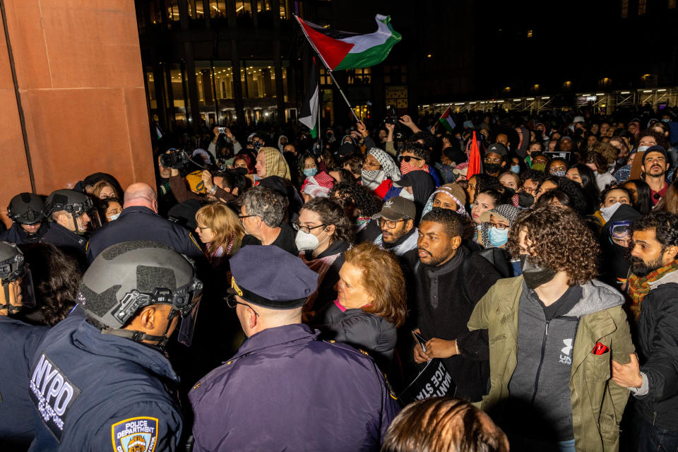 NYPD officers detain pro-Palestinian students and protesters who had set up an encampment on the campus of New York University (NYU) to protest the Israel-Hamas war, April 22, 2024. / Credit: ALEX KENT/AFP/Getty