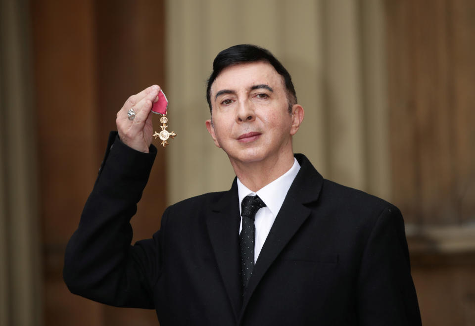 Marc Almond holds his OBE following a ceremony at Buckingham Palace in 2018. (Photo: Reuters/Yui Mok/Pool)